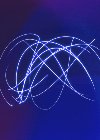 Electronically generated image of a blu background with swirling lines.